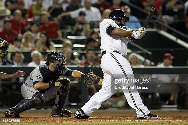 National League All-Star Prince Fielder of the Milwaukee Brewers hits a three-run home run in the fourth inning of the 82nd MLB All-Star Game at...
