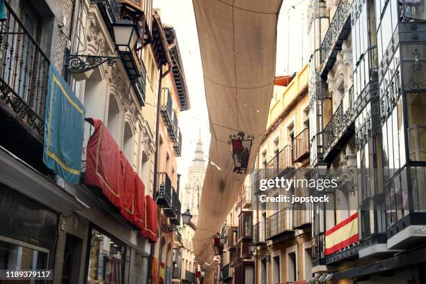 street in toledo, decorated for corpus christi festival - toledo stockfoto's en -beelden