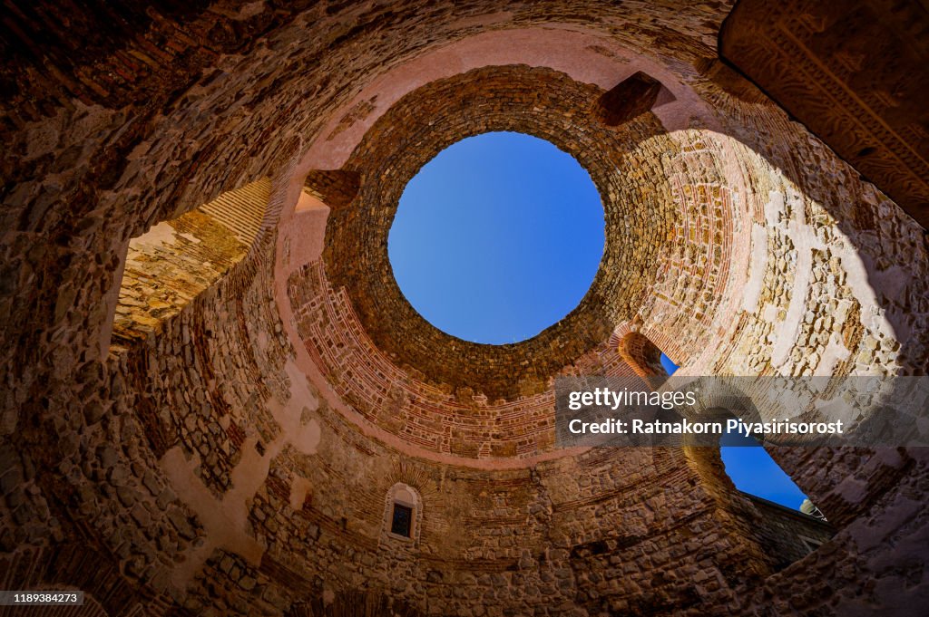 Diocletian's Palace's peristyle in front of Cathedral of Saint Domnius' bell tower in Split, Croatia. Diocletian palace UNESCO world heritage site in Split, Dalmatia, Croatia