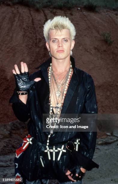 English musician, singer, songwriter, and actor, Billy Idol, poses backstage on May 23 at the Pine Knob Music Theater in Clarkston, Michigan.
