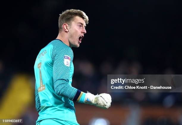 Joe Lumley of Queens Park Rangers celebrates his teams first goal during the Sky Bet Championship match between Fulham and Queens Park Rangers at...