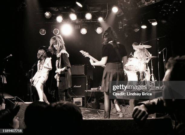 Kim Shattuck, Melanie Vammen, Ronnie Barnett, and Criss Crass perform in The Muffs at the Whisky on the Sunset Strip on October 27, 1992 in West...