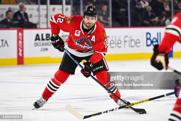 Rockford IceHogs defenceman Ian McCoshen gets ready to shoot the puck during the Rockford IceHogs versus the Laval Rocket game on December 17 at...