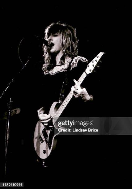 Kim Shattuck performs with Melanie Vammen, Ronnie Barnett, and Criss Crass in The Muffs at the Whisky on the Sunset Strip on October 27, 1992 in West...