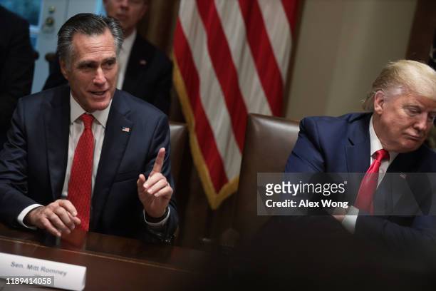 Sen. Mitt Romney speaks as President Donald Trump listens during a listening session on youth vaping of electronic cigarette on November 22, 2019 in...