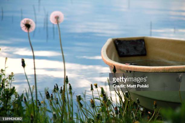 boat on a shore - lake finland bildbanksfoton och bilder