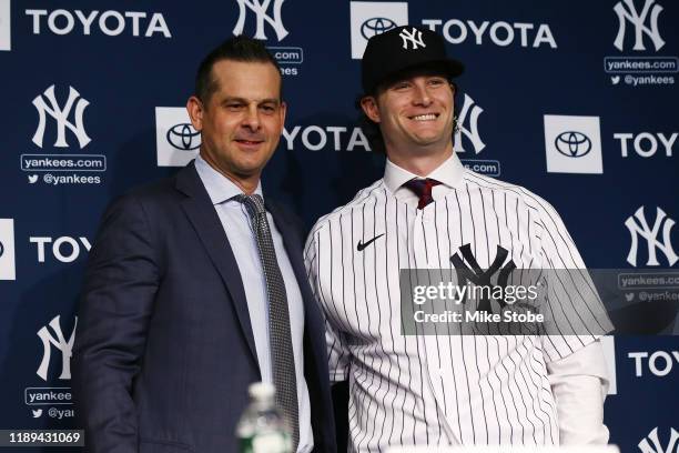 Gerrit Cole and Manager, Aaron Boone of the New York Yankees pose for a photo at Yankee Stadium during a press conference at Yankee Stadium on...