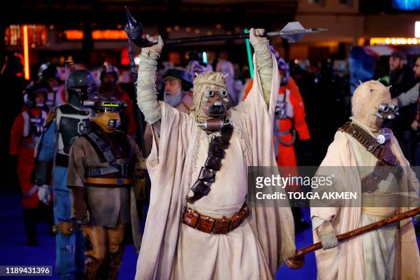 Fans dressed as Star Wars characters appear at the European film premiere of Star Wars: The Rise of Skywalker in London on December 18, 2019.