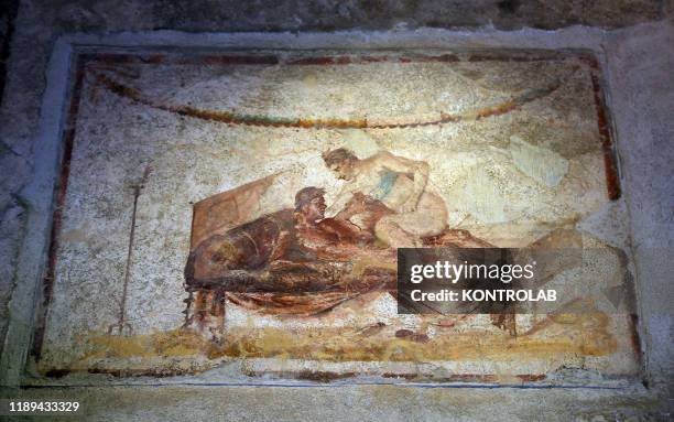 Frescoes depicting sexual realtions in the Lupanare, In the archaeological area of Pompeii, the ancient roman town buried by the eruption of Vesuvius...