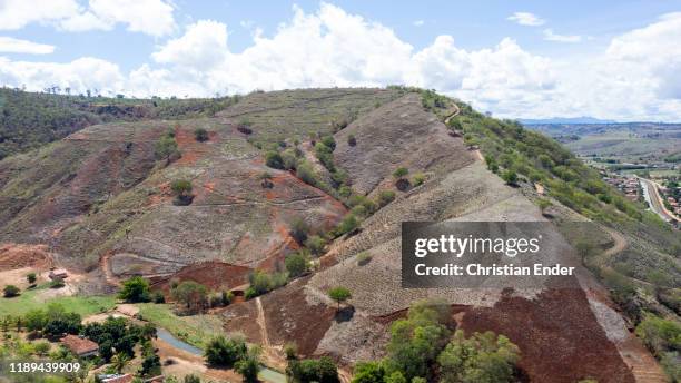 Aerial view of a former well-preserved hill, now deforested by deforestation in the village Aimorés, near the Instituto Terra on November 22, 2019 in...