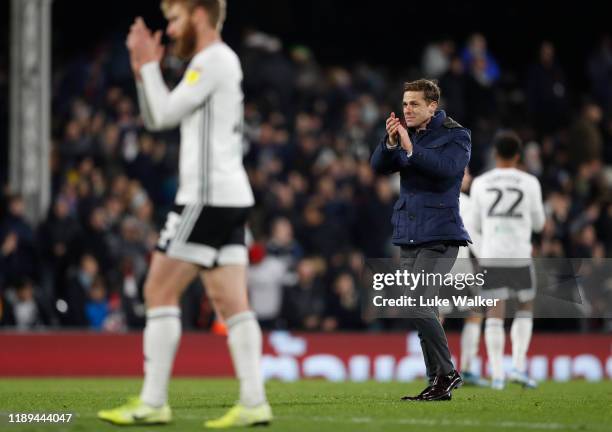 Fulham FC Manager Scott Parker acknowledges the fans after his teams win during the Sky Bet Championship match between Fulham and Queens Park Rangers...