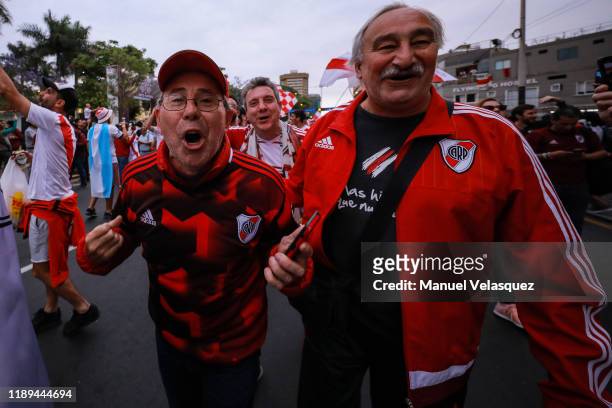 Fans of River Plate cheer in the streets of the Miraflores neighborhood, ahead of the final match of Copa CONMEBOL Libertadores 2019 on November 22,...
