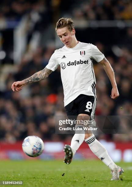 Stefan Johansen of Fulham passes the ball during the Sky Bet Championship match between Fulham and Queens Park Rangers at Craven Cottage on November...