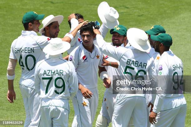 Naseem Shah of Pakistan celebrates after taking his first test wicket, the wicket of David Warner of Australia during day three of the 1st Domain...