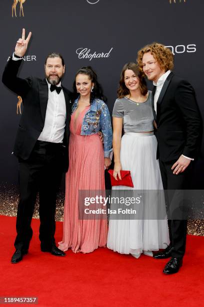 British singer Rea Garvey, his wife Josephine Garvey and German singer Michael Schulte and his wife Katharina Mayer arrive for the 71st Bambi Awards...