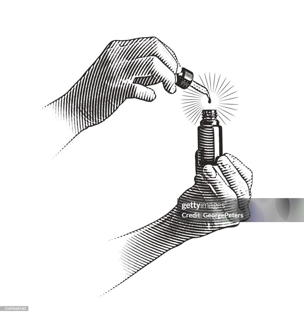 Manos de mujer usando botella y pipeta de aceite CBD