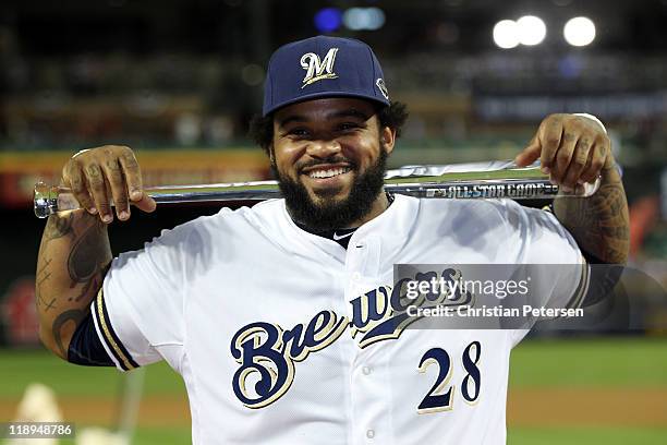 National League All-Star Prince Fielder of the Milwaukee Brewers poses with the Ted Williams Most Valuable Player Award after the National League...