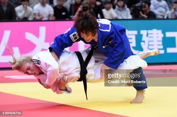 Kim Polling of Netherlands and Yoko Ono of Japan compete in the Women's -70kg Final on day two of the Judo Grand Slam at the Maruzen Intec Arena...