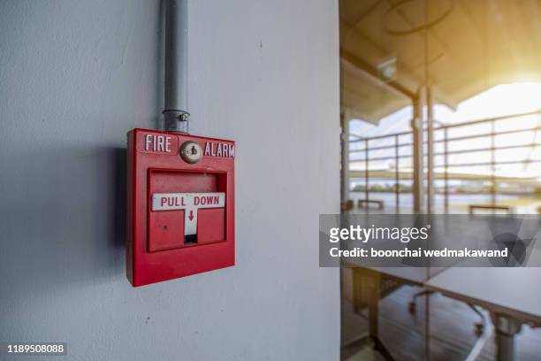 fire alarm signal on brick wall - wall building feature stock pictures, royalty-free photos & images