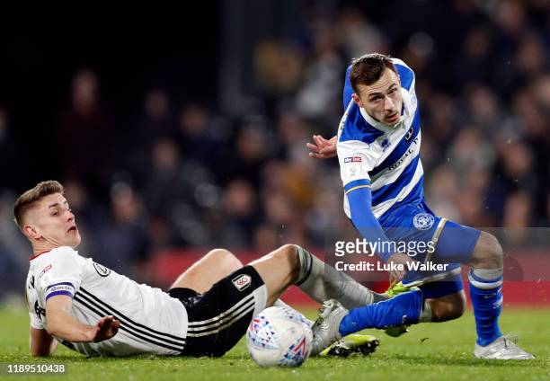 Josh Scowen of Fulham v Queens Park Rangers is challenged by Tom Cairney of Fulham during the Sky Bet Championship match between Fulham and Queens...