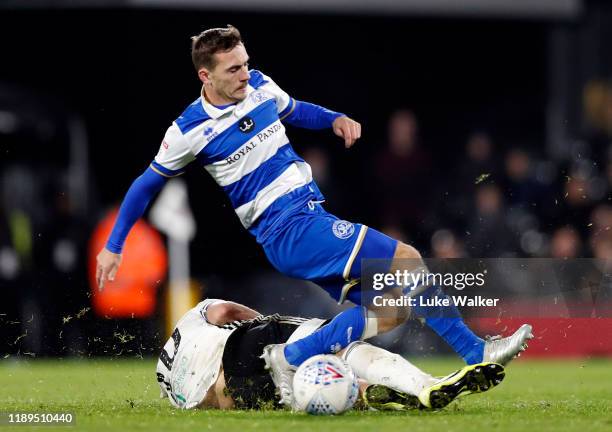 Josh Scowen of Fulham v Queens Park Rangers is challenged by Tom Cairney of Fulham during the Sky Bet Championship match between Fulham and Queens...