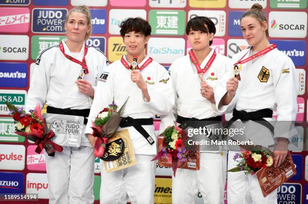 Silver medlaist Kim Polling of Netherlands, gold medalist Yoko Ono of Japan and bronze medalists Chizuru Arai of Japan and Giovanna Scoccimarro of...