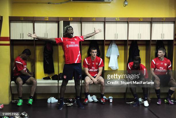 Denilson, Alex Song, Sebastien Squillaci, Johan Djourou and Andrey Arshavin of Arsenal prepare in the dressing room before a training session at the...