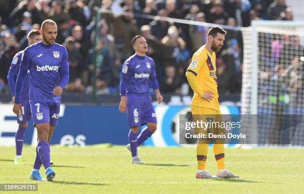 Lionel Messi of FC Barcelona reacts after Leganes score the first goal during the La Liga match between CD Leganes and FC Barcelona at Estadio...