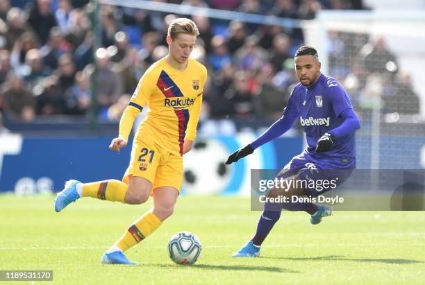 Frenkie de Jong of FC Barcelona is challenged by Yousseff En-Nesyri of Leganes during the La Liga match between CD Leganes and FC Barcelona at...