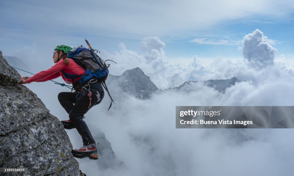 Female climber on a rocky wall