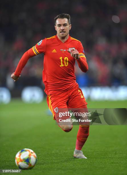 Wales player Aaron Ramsey in action during the UEFA Euro 2020 qualifier between Wales and Hungary at Cardiff City Stadium on November 19, 2019 in...