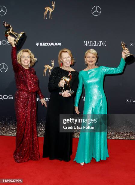 Award winners German actress Michaela May, German actress Gabi Dohm and German actress Uschi Glas pose with award during the 71st Bambi Awards...