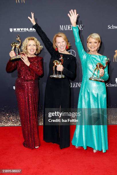 Award winners German actress Michaela May, German actress Gabi Dohm and German actress Uschi Glas pose with award during the 71st Bambi Awards...