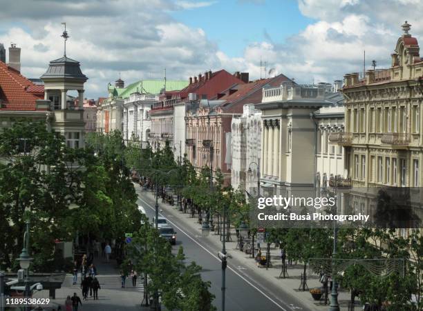 view from above of gediminas avenue (lithuanian: gedimino prospektas), the main boulevard of vilnius, lithuania - vilnius stock pictures, royalty-free photos & images