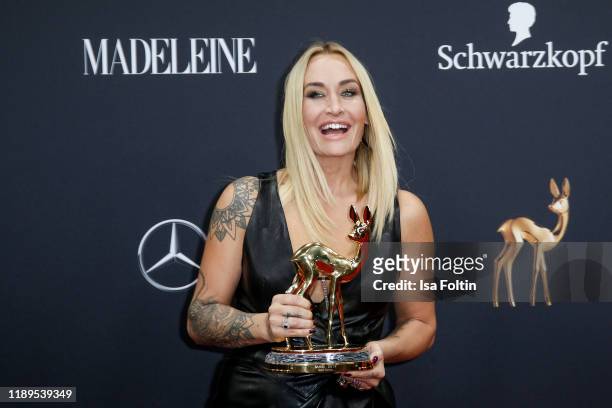 German singer and award winner Sarah Connor poses with award during the 71st Bambi Awards winners board at Festspielhaus Baden-Baden on November 21,...