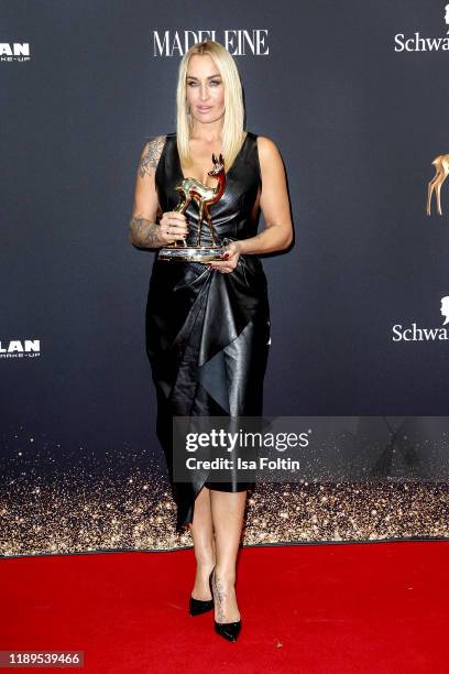 German singer and award winner Sarah Connor poses with award during the 71st Bambi Awards winners board at Festspielhaus Baden-Baden on November 21,...