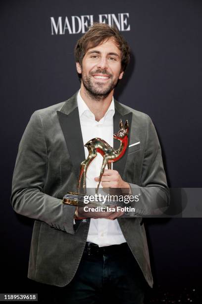 German singer and award winner Max Giesinger poses with award during the 71st Bambi Awards winners board at Festspielhaus Baden-Baden on November 21,...