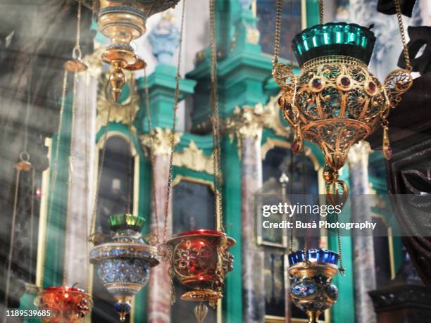 richly decorated censers (incense burners) inside the orthodox church of the holy spirit in vilnius, lithuania - vilnius street stock pictures, royalty-free photos & images