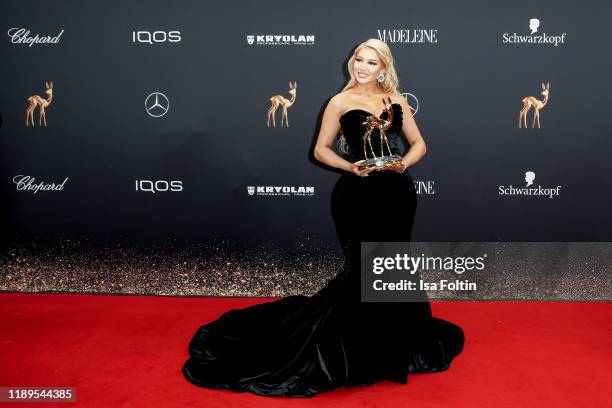 Influencer and award winner Shirin David poses with award during the 71st Bambi Awards winners board at Festspielhaus Baden-Baden on November 21,...