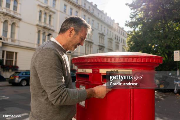Person Getting Mail Man Getting Mail Mailbox Photos and Premium High Res Pictures - Getty ...