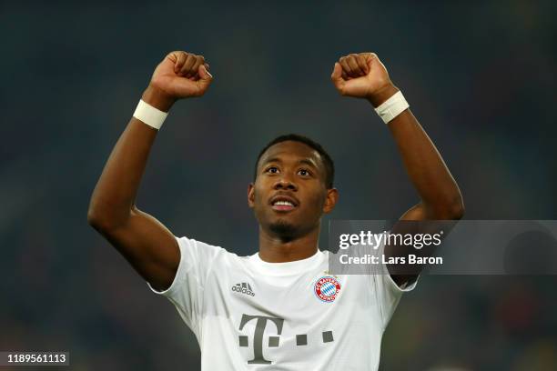 David Alaba of FC Bayern Munich celebrates after his sides victory in the Bundesliga match between Fortuna Duesseldorf and FC Bayern Muenchen at...