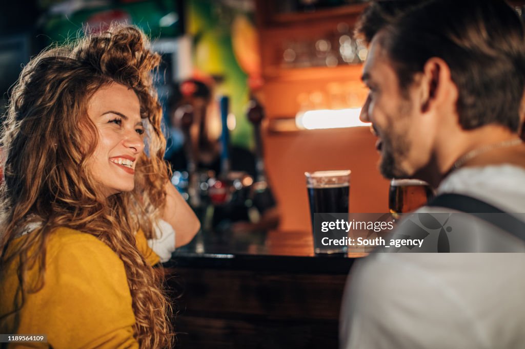 Young couple in pub