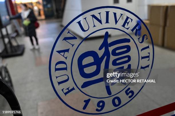 In this picture taken on December 18 a Fudan University sign is seen on the campus in Shanghai. - One of China's top universities has removed...