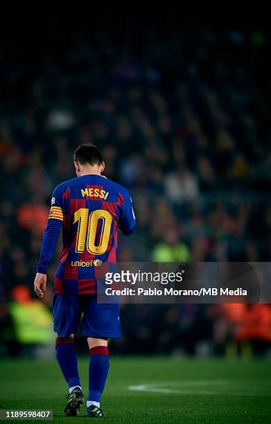 Lionel Messi of Barcelona looks on during the Liga match between FC Barcelona and Real Madrid CF at Camp Nou on December 18, 2019 in Barcelona, Spain.
