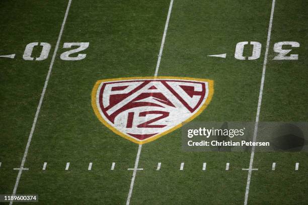 Pac-12 logo on the field during the NCAAF game at Sun Devil Stadium on November 09, 2019 in Tempe, Arizona. The Trojans defeated the Sun Devils 31-26.