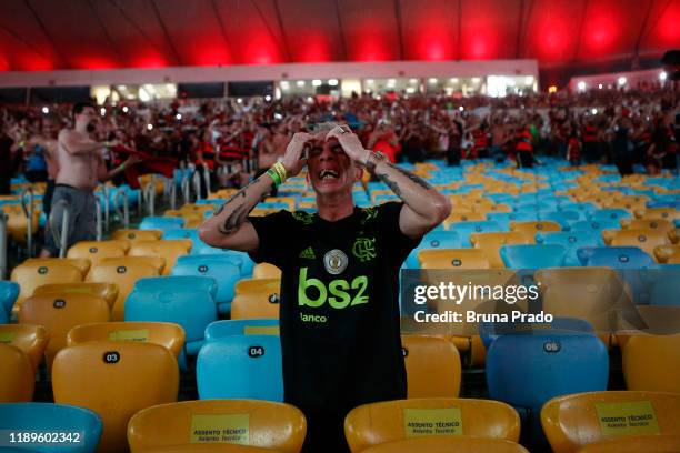 Fan of Flamengo celebrates their team's win after the Flamengo v River Plate Copa CONMEBOL Libertadores 2019 Final at Maracana Stadium on November...