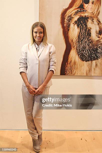 Lara Bingle poses for a photo at the launch of ROC Eyewear Range at Darlinghurst on July 13, 2011 in Sydney, Australia.