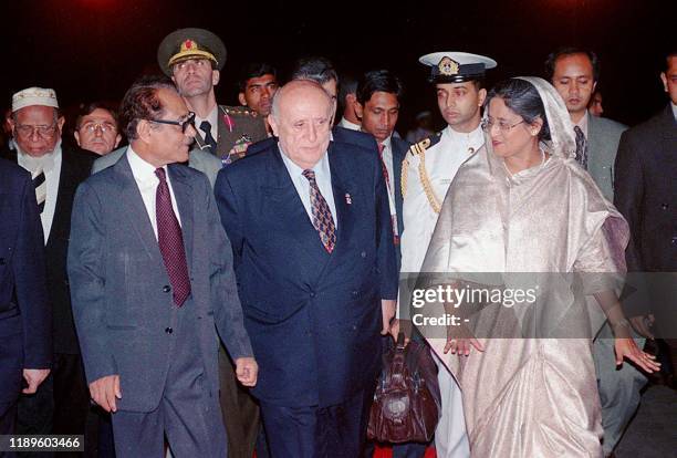 Turkish President Suleyman Demirel is greeted by Bangladesh President Shahabuddin Ahmed and Prime Minister Sheikh Hasina Wajed upon arrival at Dhaka...