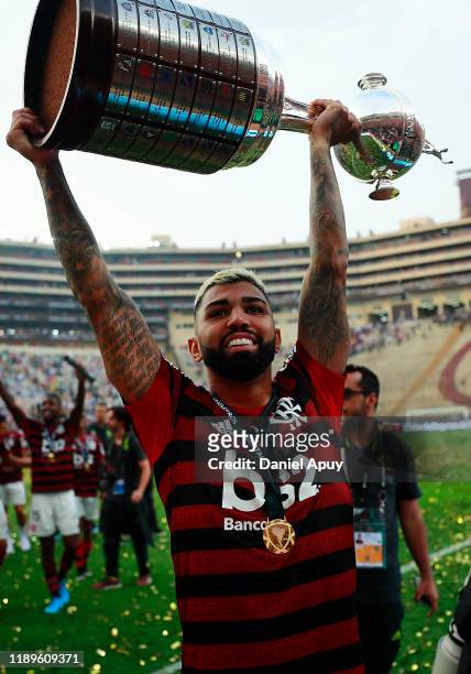 Gabriel Barbosa of Flamengo celebrates with the trophy after winning the final match of Copa CONMEBOL Libertadores 2019 between Flamengo and River...