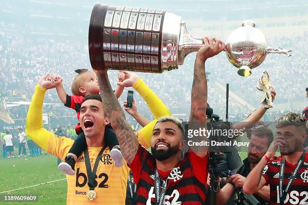 Gabriel Barbosa of Flamengo lifts the trophy after winning the during the final match of Copa CONMEBOL Libertadores 2019 between Flamengo and River...